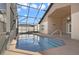 Relaxing screened pool with a patio, perfect for outdoor enjoyment at 4525 Oakbrook Ct, Kissimmee, FL 34746