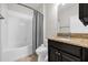 Clean bathroom with granite vanity and tub shower combo at 4540 Sequel Rd, Kissimmee, FL 34746
