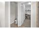 Small bathroom with toilet and linen closet at 4540 Sequel Rd, Kissimmee, FL 34746
