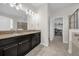 Double vanity bathroom with granite countertop at 4540 Sequel Rd, Kissimmee, FL 34746