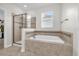 Bathroom with soaking tub and walk-in shower at 4540 Sequel Rd, Kissimmee, FL 34746