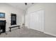 Bedroom with mirrored closet doors and home office area at 4540 Sequel Rd, Kissimmee, FL 34746