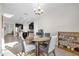 Casual dining area with table and chairs, open to kitchen at 4540 Sequel Rd, Kissimmee, FL 34746