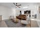 Open living room and kitchen area with tile floors at 4540 Sequel Rd, Kissimmee, FL 34746