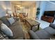 Inviting living room offering ample seating and a view into the dining area, perfect for gatherings at 4557 Ada Ln, Kissimmee, FL 34746