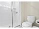 Clean bathroom featuring a shower and toilet at 4818 Memories Ln, Kissimmee, FL 34746