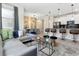 Living area featuring a sectional sofa and a coffee table at 4818 Memories Ln, Kissimmee, FL 34746