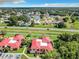 Aerial view showing a townhouse and surrounding neighborhood at 540 Hunter Cir, Kissimmee, FL 34758