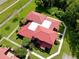 Aerial view of a red-roofed townhouse community at 540 Hunter Cir, Kissimmee, FL 34758