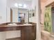 Simple bathroom with a vanity and shower/tub combo at 540 Hunter Cir, Kissimmee, FL 34758