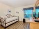 Cozy bedroom with daybed, dresser, and window views at 540 Hunter Cir, Kissimmee, FL 34758