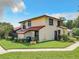 Exterior view of a two-story townhouse with red tile roof at 540 Hunter Cir, Kissimmee, FL 34758