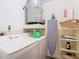 Functional laundry room with washer, dryer, and storage at 540 Hunter Cir, Kissimmee, FL 34758