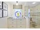 Bathroom features a walk-in shower and granite vanity at 580 Teesdale, Haines City, FL 33844