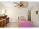 Charming bedroom with a ceiling fan and built-in dresser at 580 Teesdale, Haines City, FL 33844