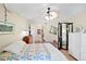 Spacious bedroom with a ceiling fan and large windows at 580 Teesdale, Haines City, FL 33844