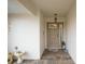 Covered entryway with tiled flooring and decorative accents at 580 Teesdale, Haines City, FL 33844