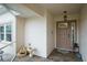 Covered entryway with tiled flooring and decorative accents at 580 Teesdale, Haines City, FL 33844
