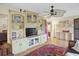 Spacious living room with built-in shelving and a ceiling fan at 580 Teesdale, Haines City, FL 33844