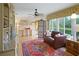 Sunroom with pond view and built-in workspace at 580 Teesdale, Haines City, FL 33844