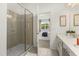 Bathroom with shower and view into bedroom at 6052 Broad Oak Dr, Davenport, FL 33837