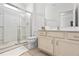 Bathroom with shower and updated vanity at 6052 Broad Oak Dr, Davenport, FL 33837
