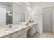 Modern bathroom with double vanity and walk-in shower at 6052 Broad Oak Dr, Davenport, FL 33837