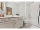 Clean bathroom with tub and updated vanity at 6052 Broad Oak Dr, Davenport, FL 33837