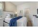 Comfortable bedroom with queen-size bed and ensuite bathroom at 6052 Broad Oak Dr, Davenport, FL 33837