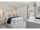 Spacious bedroom with plush bed and neutral decor at 6052 Broad Oak Dr, Davenport, FL 33837