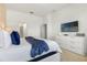 Spacious bedroom with large TV and dresser at 6052 Broad Oak Dr, Davenport, FL 33837