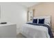 Cozy bedroom with a queen bed and soft bedding at 6052 Broad Oak Dr, Davenport, FL 33837