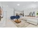 Spacious living area with sectional sofa and open floor plan at 6052 Broad Oak Dr, Davenport, FL 33837