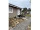 Outdoor space featuring a patio set and a view of the fenced yard at 704 N 8Th St, Haines City, FL 33844