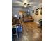 Spacious living room featuring hardwood floors and leather furniture at 704 N 8Th St, Haines City, FL 33844