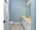 Bathroom with double vanity and a shower at 706 Westpark Way # 103, Celebration, FL 34747