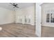 Bright living room with hardwood floors and French doors at 706 Westpark Way # 103, Celebration, FL 34747