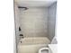 Updated bathroom with a new bathtub and shower at 7450 Crooked Lake Cir, Orlando, FL 32818