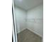 Large walk-in closet with wire shelving at 7450 Crooked Lake Cir, Orlando, FL 32818