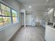 Spacious dining area with large window and hardwood floors at 7450 Crooked Lake Cir, Orlando, FL 32818