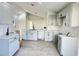 Renovated kitchen featuring gray cabinets and white subway tile at 7450 Crooked Lake Cir, Orlando, FL 32818