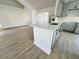 Modern kitchen with island and stainless steel sink at 7450 Crooked Lake Cir, Orlando, FL 32818
