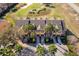 Aerial view of townhomes and the golf course in the community at 7588 Assembly Ln, Reunion, FL 34747