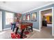 Fun-filled game room with foosball table, pool table, and themed decor at 7588 Assembly Ln, Reunion, FL 34747