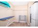 Functional storage room with shelving, space for a crib, and a utility closet for organized living at 7588 Assembly Ln, Reunion, FL 34747