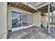 Ground level patio with sliding glass doors at 776 E Michigan St # 63, Orlando, FL 32806