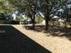 Large backyard with mature trees and a patio table at 1972 S Old Mill Dr, Deltona, FL 32725