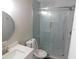 Clean bathroom with a walk-in shower, white vanity, and modern fixtures at 1972 S Old Mill Dr, Deltona, FL 32725