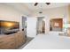 Main bedroom with bathroom access and a dresser at 12538 Floridays Resort Dr # 411, Orlando, FL 32821