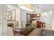 Dining area with glass table and kitchen view at 12538 Floridays Resort Dr # 411, Orlando, FL 32821